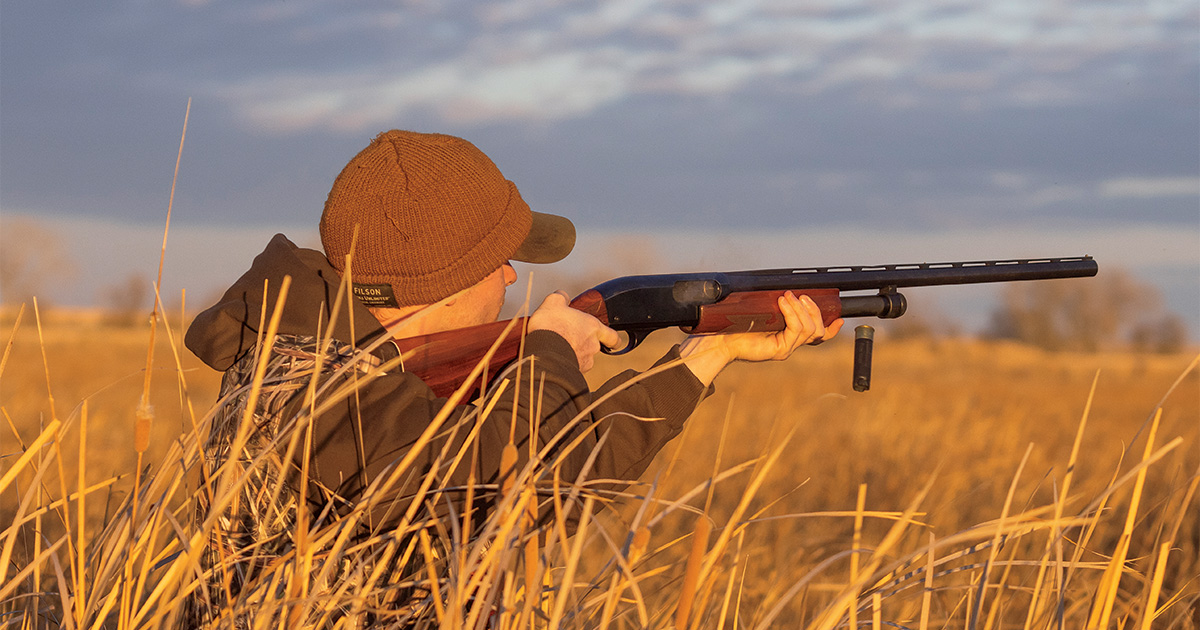 Hunter shooting a pump-action shotgun. Photo by DougSteinke.com.jpg